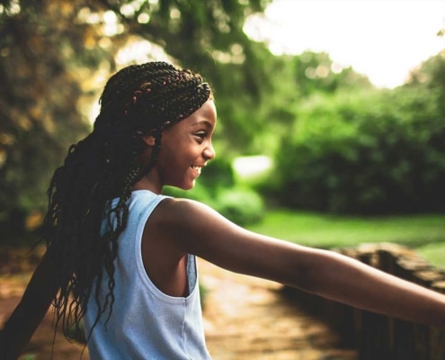 girl smiles in nature