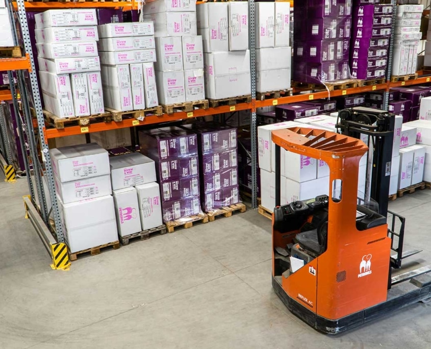 orange forklift in a warehouse