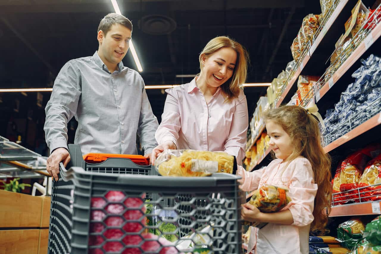 Family grocery shopping together