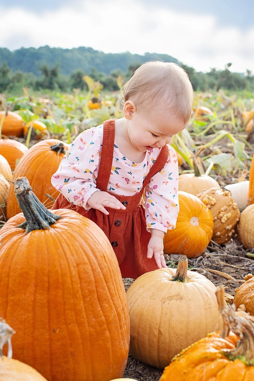 Baby with Pumpkins