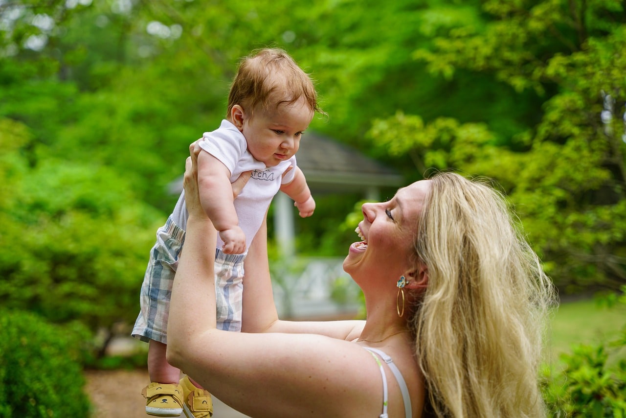 mother smiling at baby